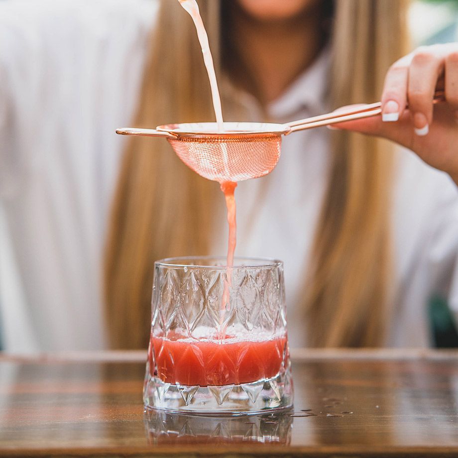 Bartender making cocktail